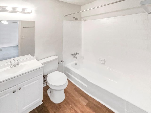 6354 Shannon Pkwy Unit 8B, Union City, GA 30291 - bathroom featuring shower / washtub combination, vanity, and wood finished floors