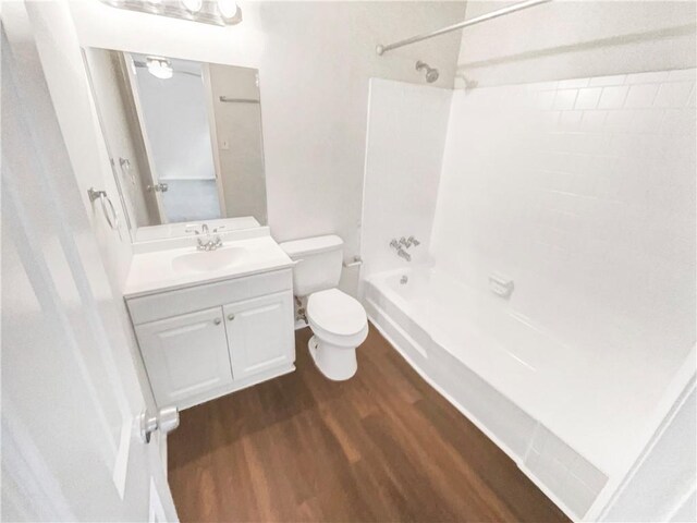 6354 Shannon Pkwy Unit 8B, Union City, GA 30291 - bathroom with wood finished floors, washtub / shower combination, and vanity