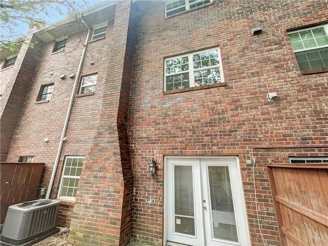 6354 Shannon Pkwy Unit 8B, Union City, GA 30291 - view of property exterior with french doors and brick siding