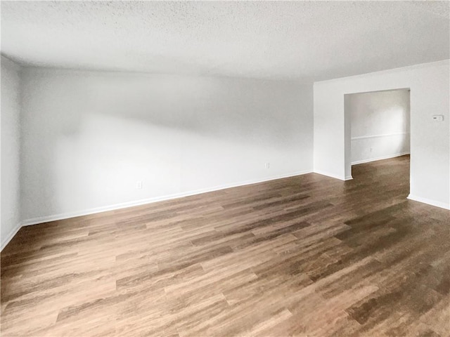 6354 Shannon Pkwy Unit 8B, Union City, GA 30291 - unfurnished room featuring wood finished floors and a textured ceiling