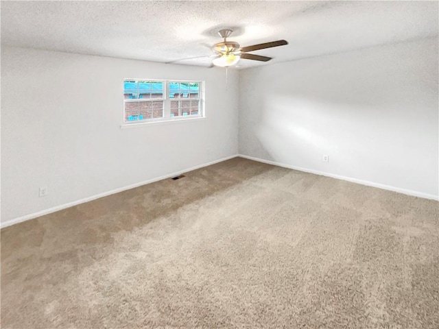 6354 Shannon Pkwy Unit 8B, Union City, GA 30291 - carpeted empty room with a ceiling fan and a textured ceiling