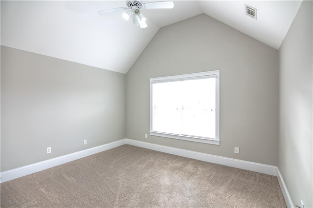 interior space featuring vaulted ceiling and ceiling fan