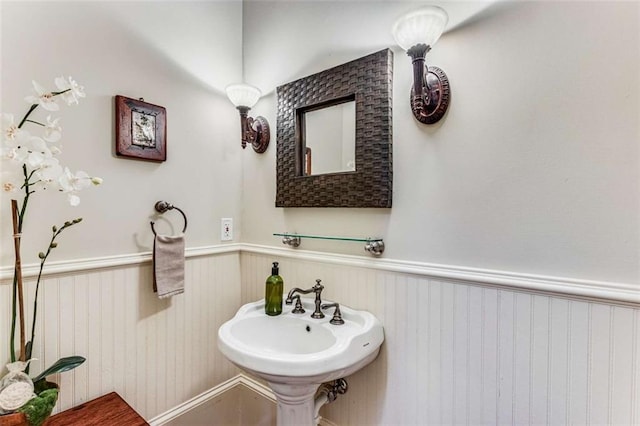 1109 Pine Grove Ave NE, Brookhaven, GA 30319 - bathroom with wainscoting and a sink