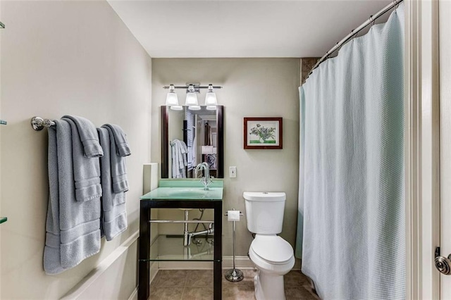 1109 Pine Grove Ave NE, Brookhaven, GA 30319 - bathroom featuring toilet, vanity, tile patterned floors, baseboards, and curtained shower