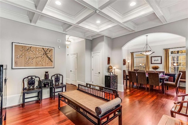 1109 Pine Grove Ave NE, Brookhaven, GA 30319 - living room with arched walkways, coffered ceiling, beamed ceiling, wood finished floors, and baseboards