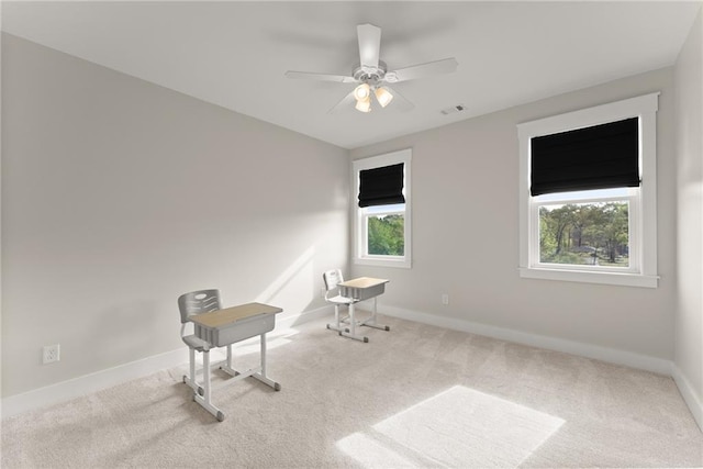 unfurnished room featuring baseboards, visible vents, and carpet floors