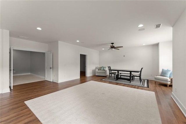 dining room with baseboards, wood finished floors, recessed lighting, and ceiling fan