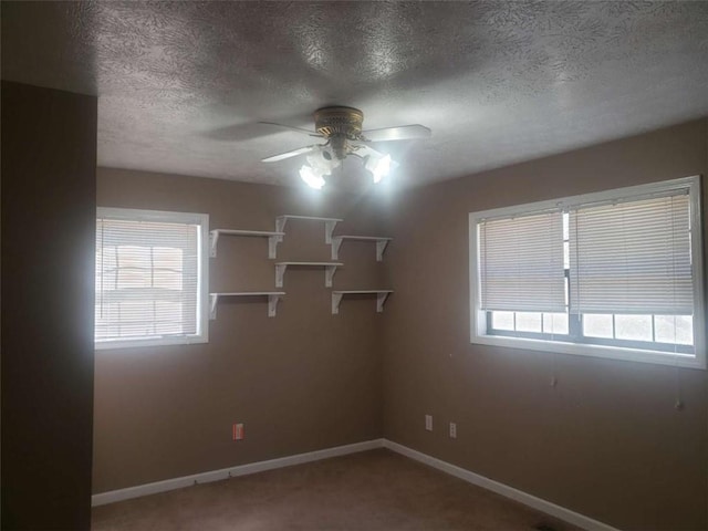 5927 Sherrie Ln, Powder Springs, GA 30127 - empty room with baseboards, carpet flooring, a textured ceiling, and ceiling fan