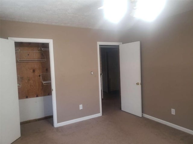 5927 Sherrie Ln, Powder Springs, GA 30127 - unfurnished bedroom with carpet floors, baseboards, and a closet