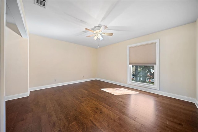 unfurnished room featuring dark hardwood / wood-style flooring and ceiling fan