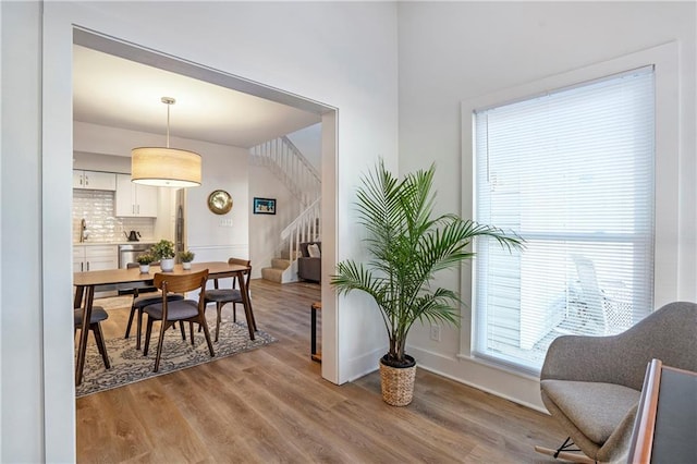 dining room with light hardwood / wood-style flooring