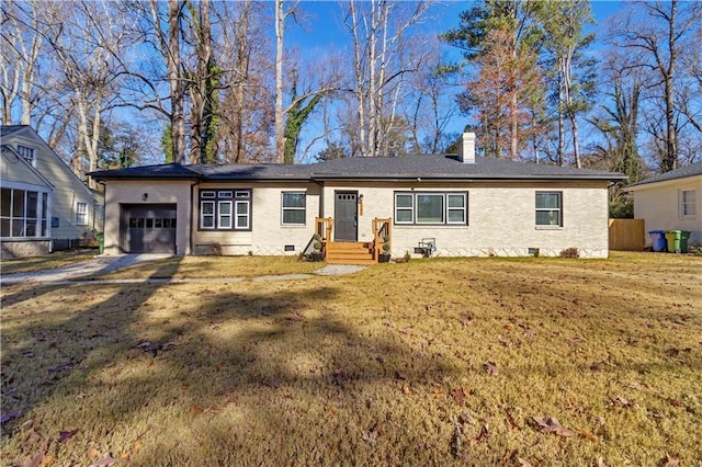 single story home featuring a garage and a front yard