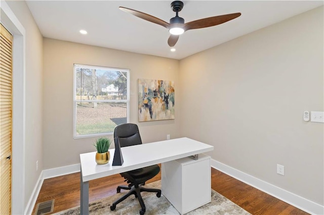 office featuring light hardwood / wood-style floors and ceiling fan