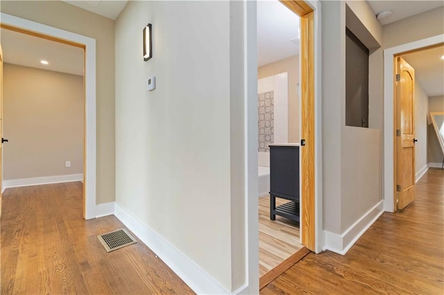 hallway featuring light wood-type flooring