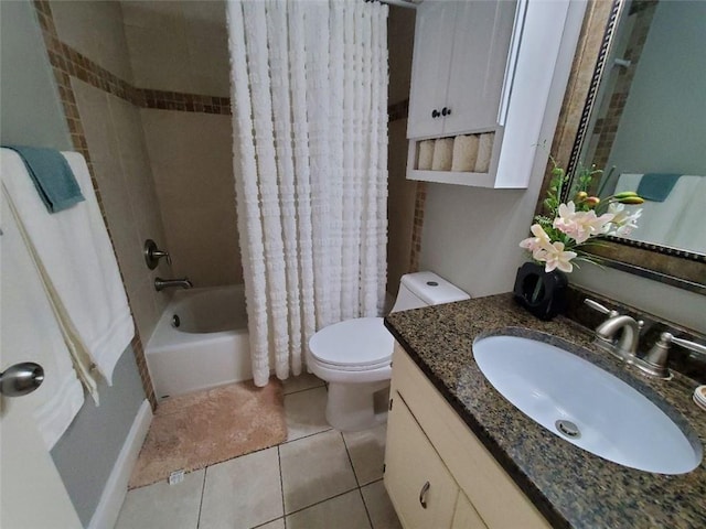 bathroom with shower / bath combination with curtain, tile patterned flooring, vanity, and toilet