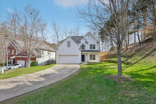 traditional home with a front lawn, an attached garage, and driveway