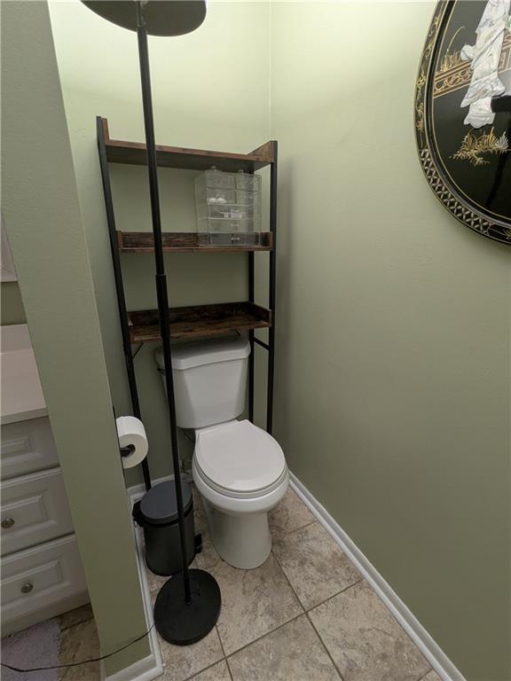 bathroom featuring toilet