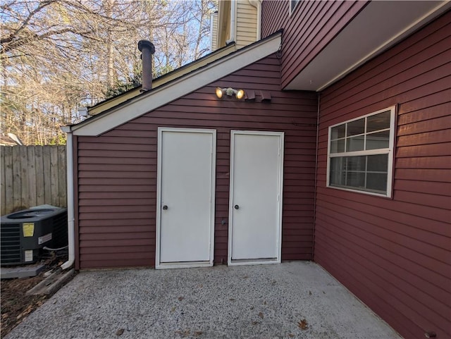 view of outbuilding featuring cooling unit