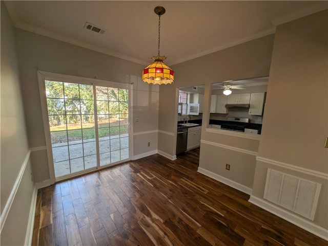 interior space with crown molding, ceiling fan, and dark hardwood / wood-style flooring