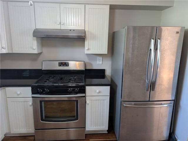 kitchen with appliances with stainless steel finishes and white cabinets