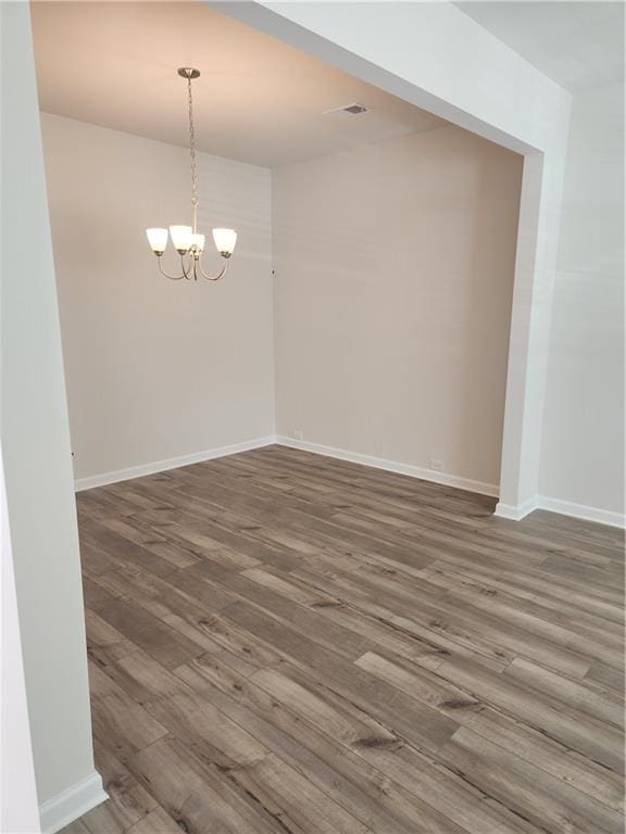 2822 Saratoga Lake Vw, Decatur, GA 30034 - unfurnished room with a chandelier and dark hardwood / wood-style floors