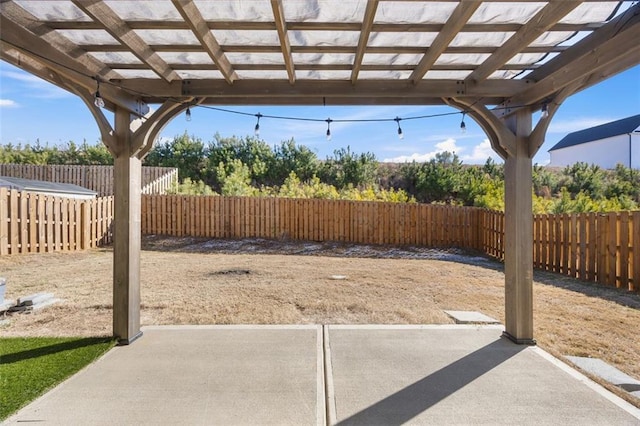 view of yard featuring a pergola and a patio