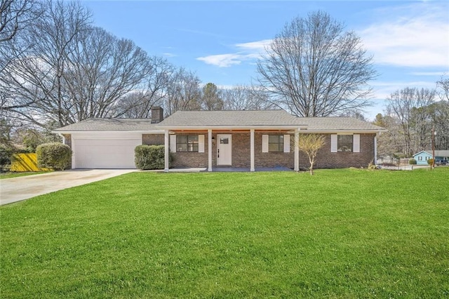 ranch-style house with driveway, an attached garage, a front yard, a chimney, and brick siding