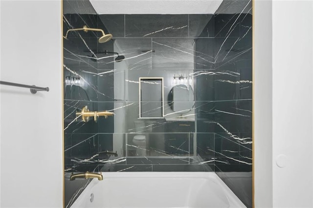 bathroom with shower / bathtub combination and tasteful backsplash