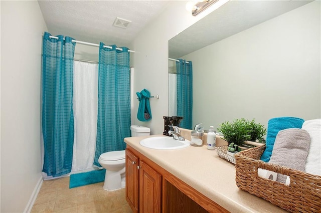 bathroom with vanity, toilet, and walk in shower