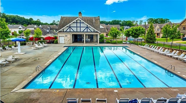 1147 Halletts Peak Pl, Lawrenceville, GA 30044 - community pool with a patio area and a residential view