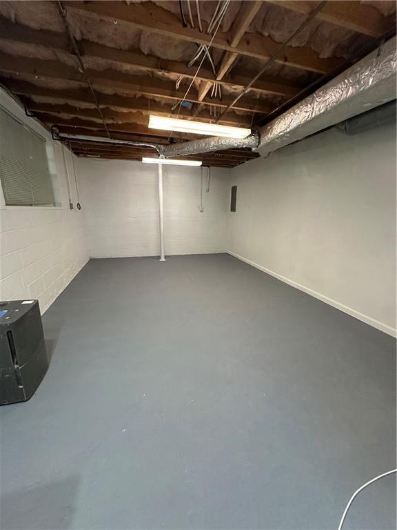 3967 Evelyn Dr, Powder Springs, GA 30127 - unfinished below grade area featuring concrete block wall
