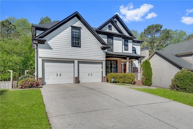 3085 Woodbridge Ln, Canton, GA 30114 - traditional home featuring brick siding, driveway, an attached garage, and a porch