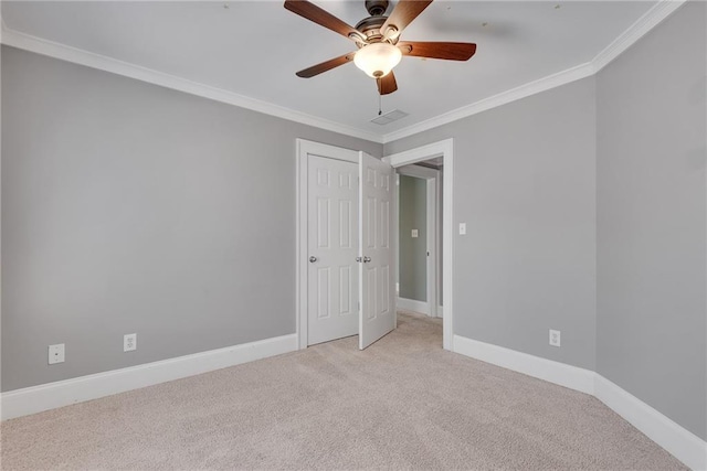 3085 Woodbridge Ln, Canton, GA 30114 - carpeted empty room with ornamental molding, a ceiling fan, and baseboards