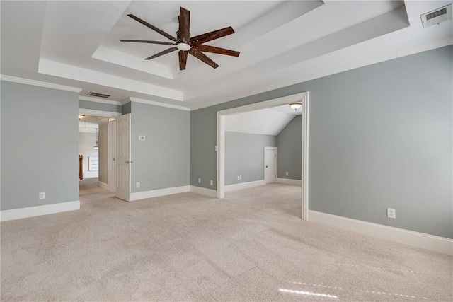 3085 Woodbridge Ln, Canton, GA 30114 - spare room with a raised ceiling, ceiling fan, light colored carpet, baseboards, and ornamental molding