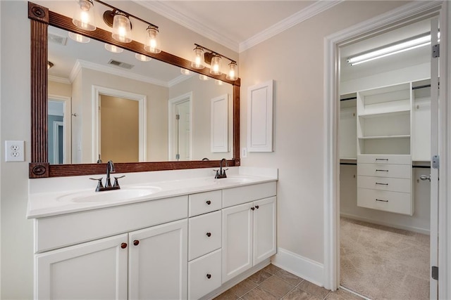 3085 Woodbridge Ln, Canton, GA 30114 - bathroom with double vanity, crown molding, baseboards, and a walk in closet