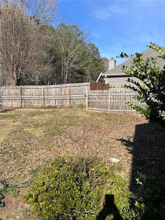 view of yard with fence