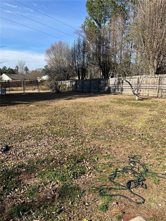 view of yard with fence