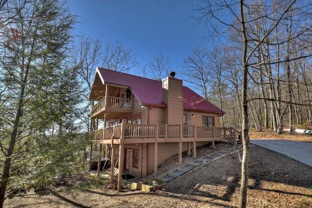 rear view of house with a deck