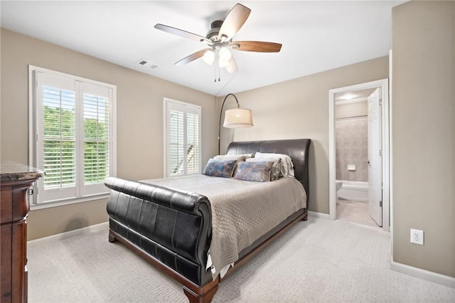 1235 Grand View Dr SE, Smyrna, GA 30126 - bedroom featuring baseboards, carpet floors, ensuite bath, and ceiling fan