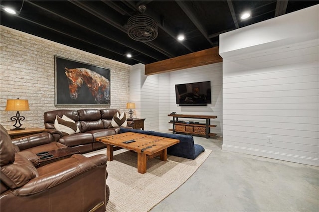 1235 Grand View Dr SE, Smyrna, GA 30126 - home theater room featuring concrete flooring, brick wall, and wood walls