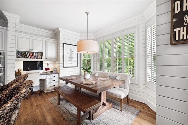 1235 Grand View Dr SE, Smyrna, GA 30126 - dining room with wood finished floors, crown molding, and wooden walls