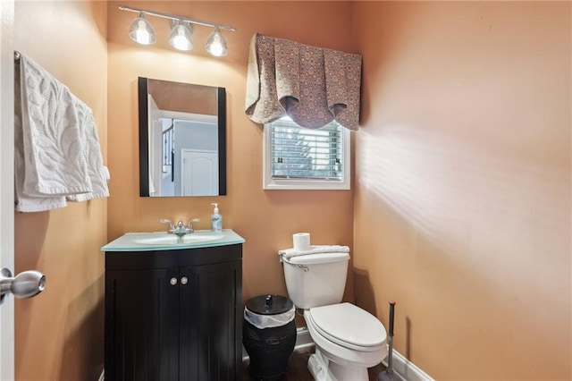 bathroom with vanity and toilet