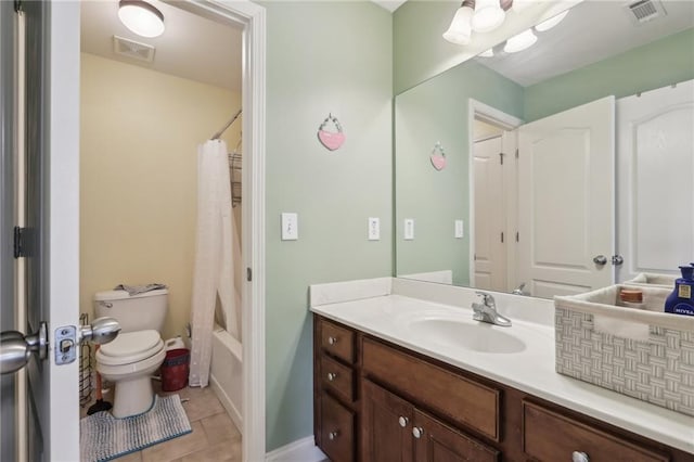 full bathroom with vanity, shower / bathtub combination with curtain, tile patterned floors, and toilet