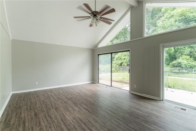 spare room featuring ceiling fan, beam ceiling, high vaulted ceiling, and wood finished floors