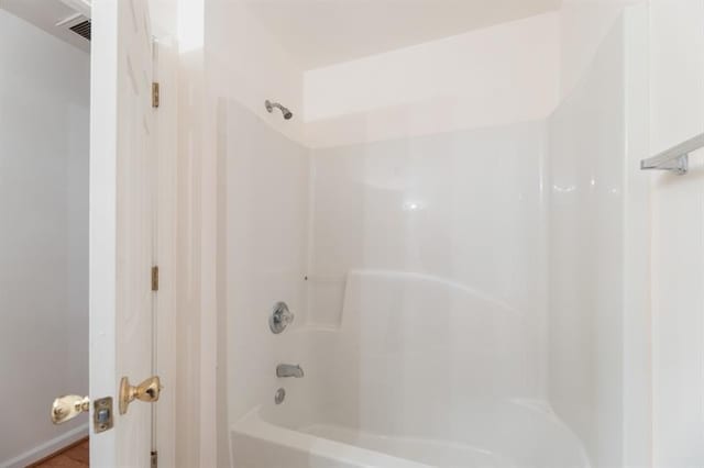 bathroom with shower / bathtub combination