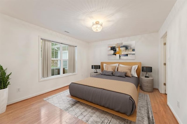 bedroom featuring wood-type flooring