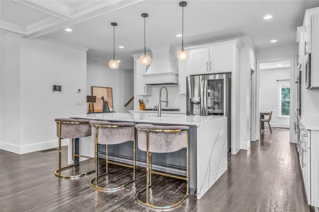 kitchen with dark wood-style flooring, custom exhaust hood, stainless steel appliances, crown molding, and recessed lighting