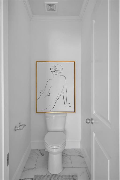 bathroom with toilet, marble finish floor, visible vents, and baseboards