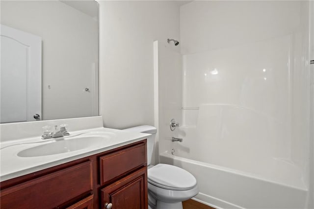 full bathroom with toilet, vanity, and shower / bath combination