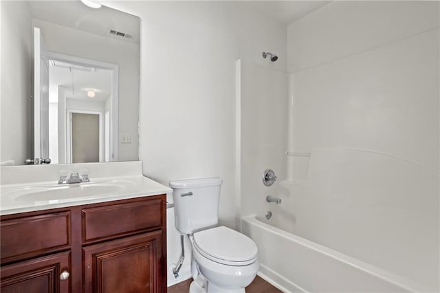 full bathroom with toilet, bathtub / shower combination, and vanity